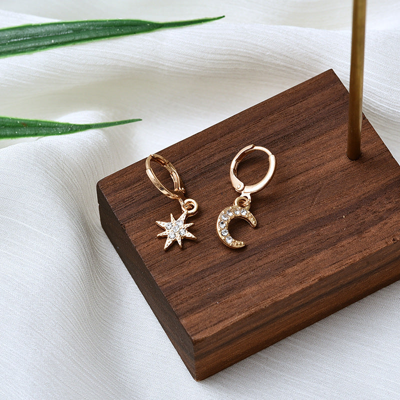 NORTH STAR DANGLE EARRINGS